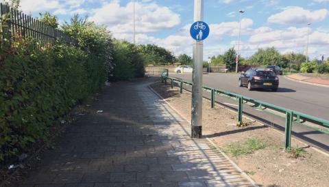 Paved footpath next to junction with Aston Church Road