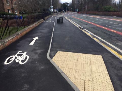 A bus stop bypass on Wilmslow Road