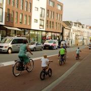 A family cycling out of the centre of Dordrecht.