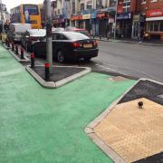 Pedestrians in the protected cycle lane