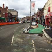 A view of the new and old cycle lanes on the Curry Mile