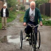 Howard Boyd on his tricycle