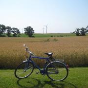 Bicycle with wind turbines behind