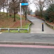 No dropped kerb or cycling route sign leading to the continuation of Vincent Drive