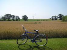 Bicycle with wind turbines behind