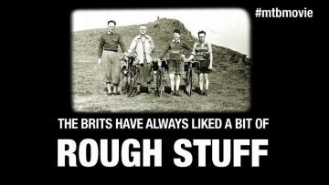 Old photo of British cycle riders on a mountain top.